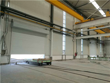 湘联抗风卷帘门随着“一带一路”走进新疆,走进北新路桥